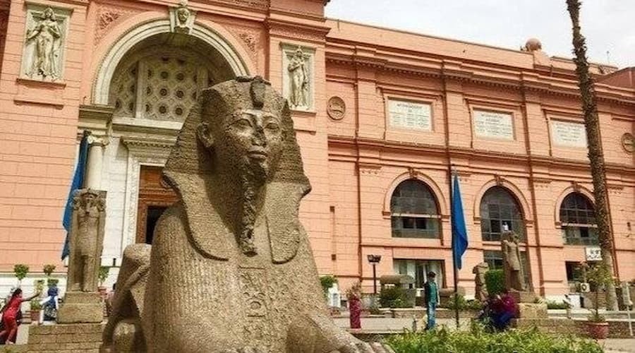 Interior view of the Egyptian Museum in Cairo showing ancient Egyptian artifacts and statues